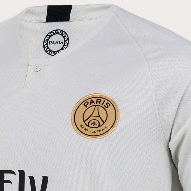 psg camisa branca e dourada